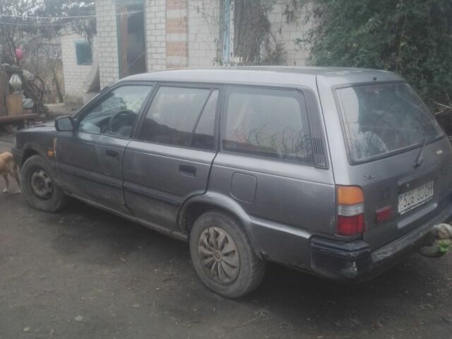 Серый Тойота Королла, объемом двигателя 1.3 л и пробегом 320 тыс. км за 523 $, фото 1 на Automoto.ua