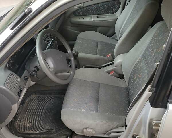 Серый Тойота Королла, объемом двигателя 1.33 л и пробегом 289 тыс. км за 3600 $, фото 5 на Automoto.ua