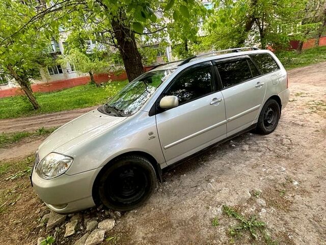 Серый Тойота Королла, объемом двигателя 2 л и пробегом 349 тыс. км за 4500 $, фото 1 на Automoto.ua