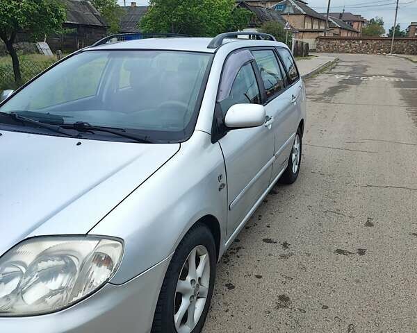 Сірий Тойота Королла, об'ємом двигуна 2 л та пробігом 295 тис. км за 4100 $, фото 1 на Automoto.ua