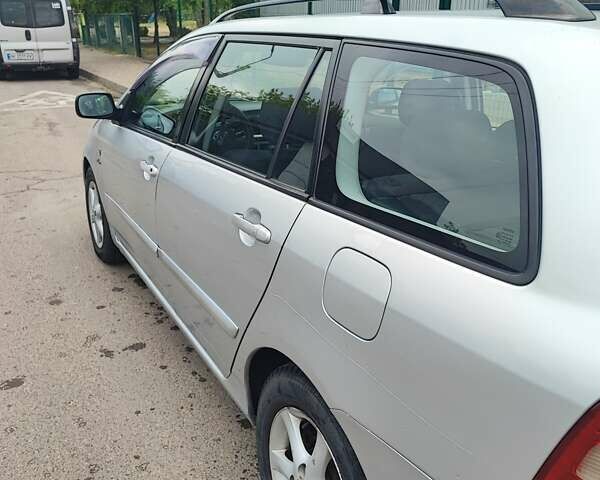 Сірий Тойота Королла, об'ємом двигуна 2 л та пробігом 295 тис. км за 4100 $, фото 2 на Automoto.ua
