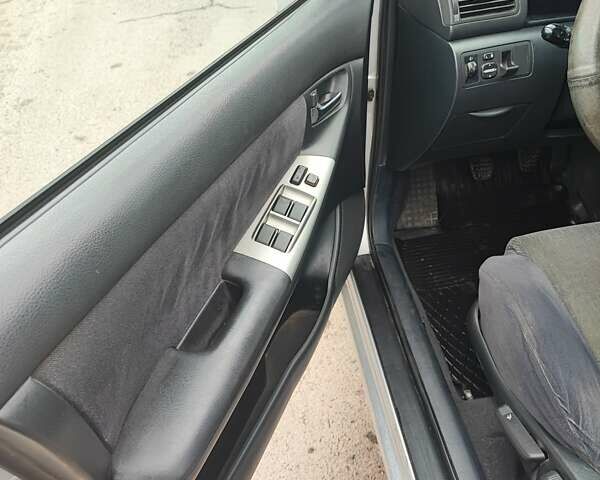 Сірий Тойота Королла, об'ємом двигуна 2 л та пробігом 295 тис. км за 4100 $, фото 8 на Automoto.ua