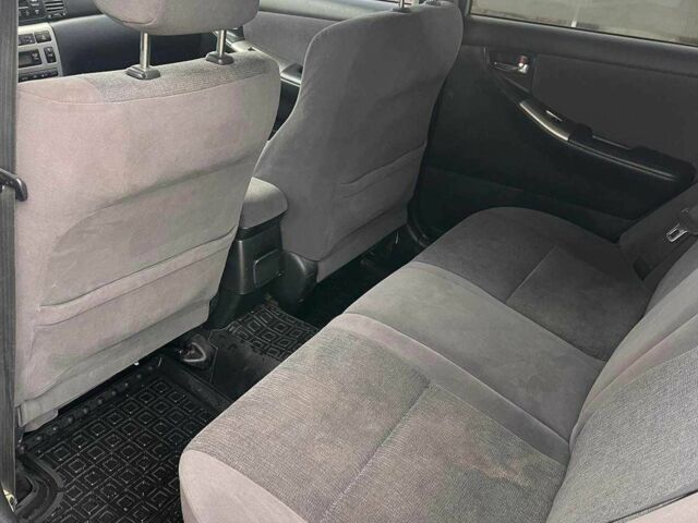 Сірий Тойота Королла, об'ємом двигуна 2 л та пробігом 320 тис. км за 1799 $, фото 9 на Automoto.ua