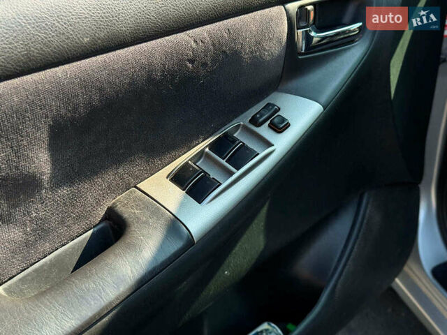 Серый Тойота Королла, объемом двигателя 2 л и пробегом 411 тыс. км за 3990 $, фото 19 на Automoto.ua