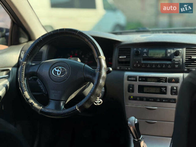 Серый Тойота Королла, объемом двигателя 2 л и пробегом 411 тыс. км за 3990 $, фото 33 на Automoto.ua