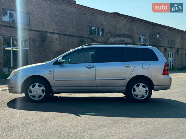 Серый Тойота Королла, объемом двигателя 2 л и пробегом 411 тыс. км за 3990 $, фото 4 на Automoto.ua