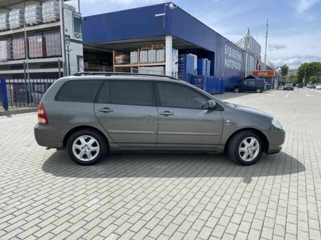 Сірий Тойота Королла, об'ємом двигуна 1.4 л та пробігом 210 тис. км за 5500 $, фото 4 на Automoto.ua