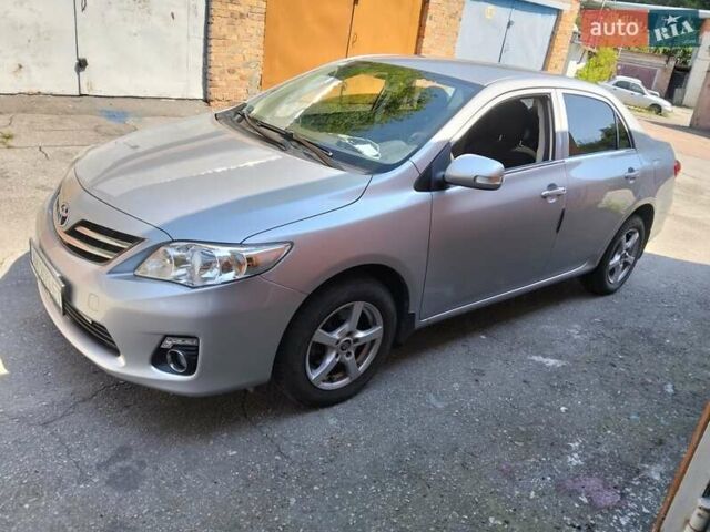 Серый Тойота Королла, объемом двигателя 1.33 л и пробегом 65 тыс. км за 9500 $, фото 1 на Automoto.ua