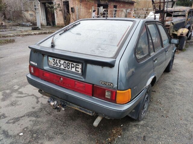 Серый Тойота Королла, объемом двигателя 1.3 л и пробегом 300 тыс. км за 238 $, фото 1 на Automoto.ua