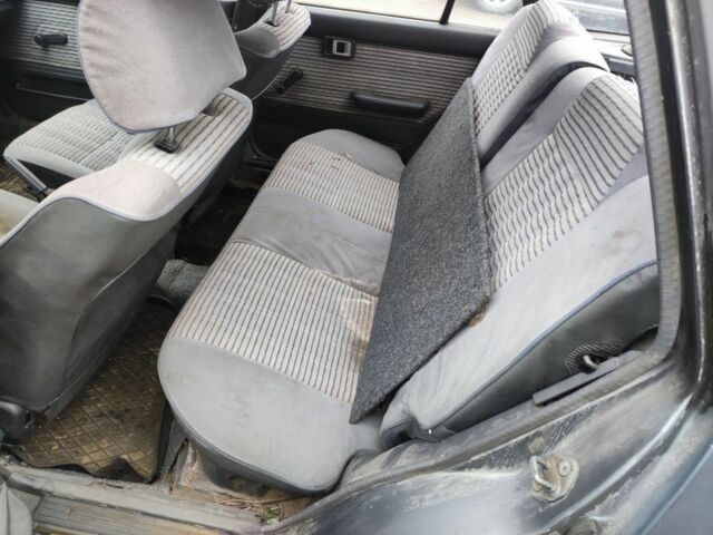 Серый Тойота Королла, объемом двигателя 1.3 л и пробегом 300 тыс. км за 238 $, фото 5 на Automoto.ua