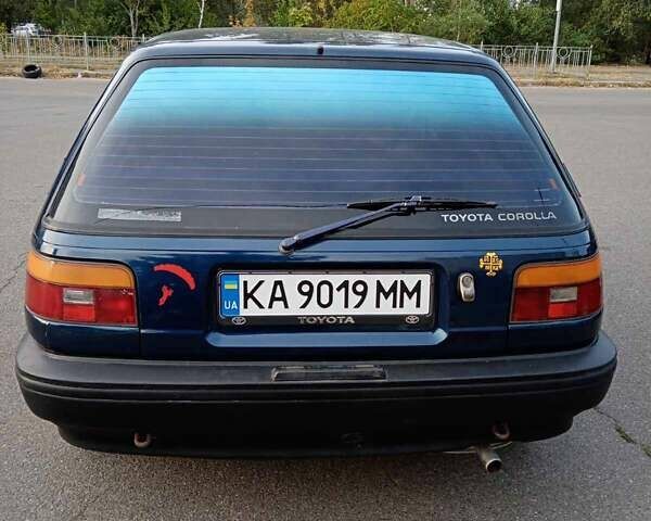 Синий Тойота Королла, объемом двигателя 1.3 л и пробегом 303 тыс. км за 2000 $, фото 1 на Automoto.ua