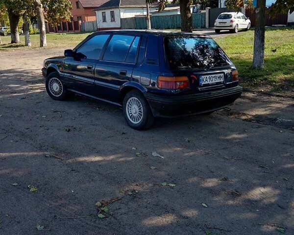 Синий Тойота Королла, объемом двигателя 1.3 л и пробегом 303 тыс. км за 2000 $, фото 3 на Automoto.ua