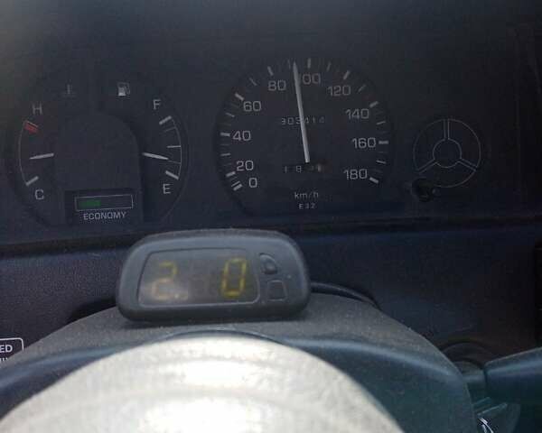 Синий Тойота Королла, объемом двигателя 1.3 л и пробегом 303 тыс. км за 2000 $, фото 11 на Automoto.ua