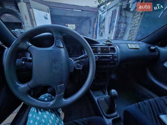 Синий Тойота Королла, объемом двигателя 1.3 л и пробегом 318 тыс. км за 2500 $, фото 9 на Automoto.ua