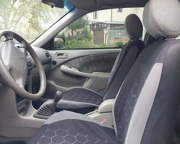 Синий Тойота Королла, объемом двигателя 1.3 л и пробегом 269 тыс. км за 2900 $, фото 19 на Automoto.ua