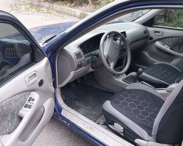 Синий Тойота Королла, объемом двигателя 1.3 л и пробегом 269 тыс. км за 2900 $, фото 13 на Automoto.ua