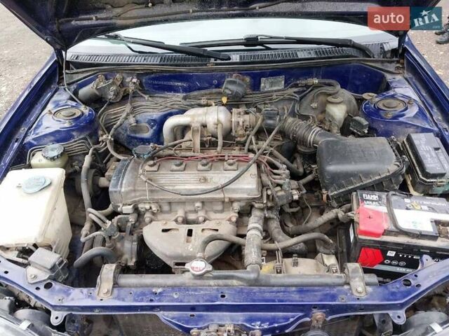 Синий Тойота Королла, объемом двигателя 1.3 л и пробегом 269 тыс. км за 2900 $, фото 6 на Automoto.ua