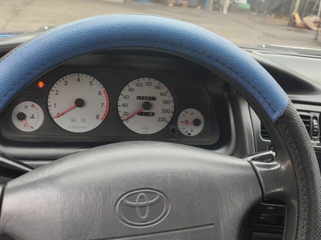 Синий Тойота Королла, объемом двигателя 1.3 л и пробегом 270 тыс. км за 3450 $, фото 8 на Automoto.ua