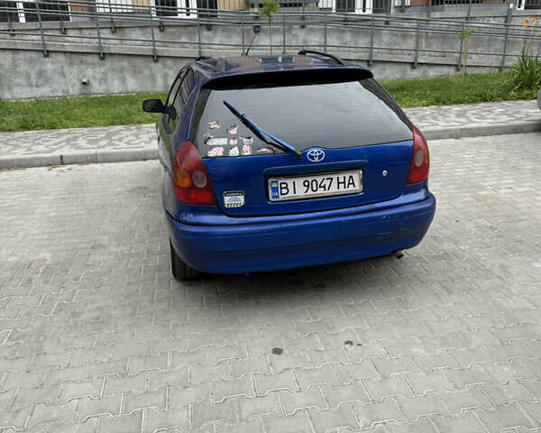 Синий Тойота Королла, объемом двигателя 1.3 л и пробегом 403 тыс. км за 2500 $, фото 3 на Automoto.ua
