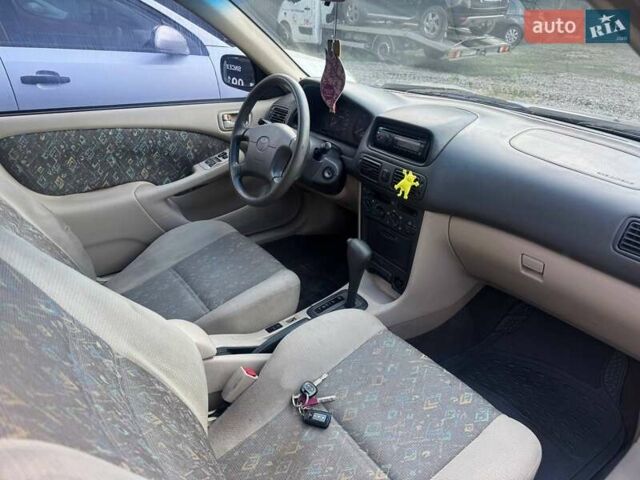 Синий Тойота Королла, объемом двигателя 1.6 л и пробегом 250 тыс. км за 2900 $, фото 5 на Automoto.ua