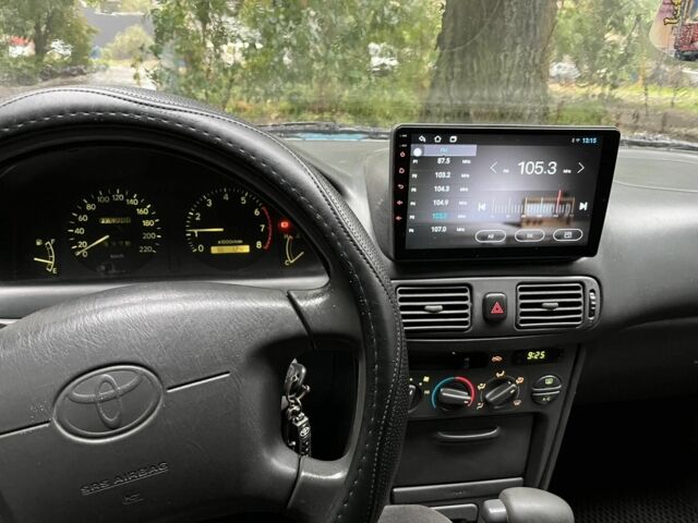 Синий Тойота Королла, объемом двигателя 1.3 л и пробегом 290 тыс. км за 3200 $, фото 6 на Automoto.ua