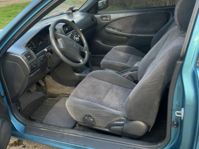 Синий Тойота Королла, объемом двигателя 1.3 л и пробегом 290 тыс. км за 3200 $, фото 2 на Automoto.ua