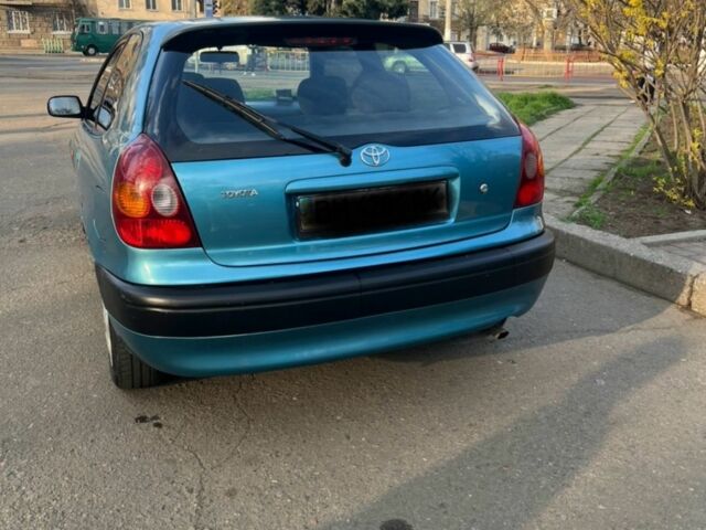 Синий Тойота Королла, объемом двигателя 1.3 л и пробегом 290 тыс. км за 3200 $, фото 5 на Automoto.ua