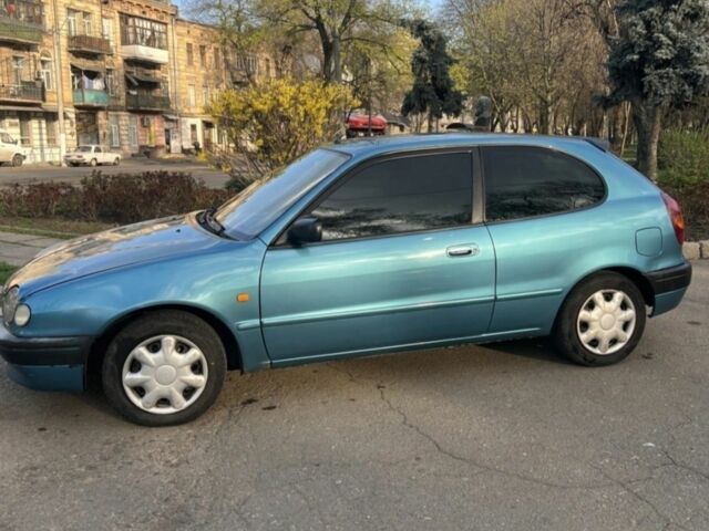 Синий Тойота Королла, объемом двигателя 1.3 л и пробегом 290 тыс. км за 3200 $, фото 4 на Automoto.ua