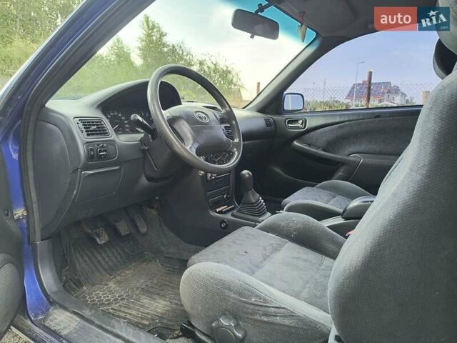 Синий Тойота Королла, объемом двигателя 1.4 л и пробегом 223 тыс. км за 2500 $, фото 1 на Automoto.ua