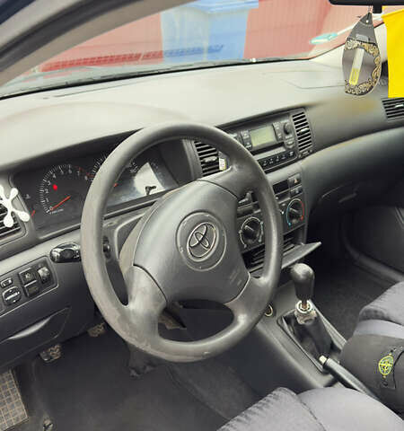 Синий Тойота Королла, объемом двигателя 1.6 л и пробегом 308 тыс. км за 3600 $, фото 9 на Automoto.ua