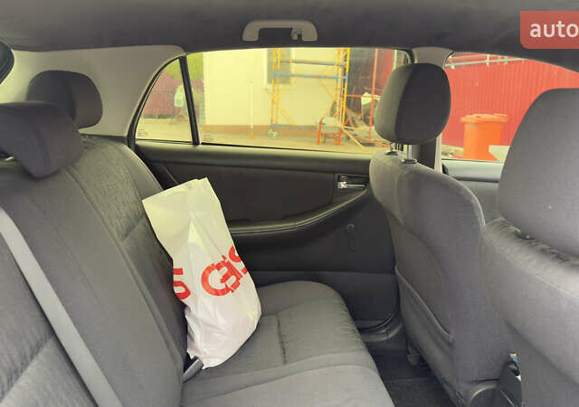 Синий Тойота Королла, объемом двигателя 1.6 л и пробегом 308 тыс. км за 3600 $, фото 7 на Automoto.ua