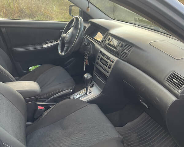 Синий Тойота Королла, объемом двигателя 1.6 л и пробегом 230 тыс. км за 5700 $, фото 6 на Automoto.ua