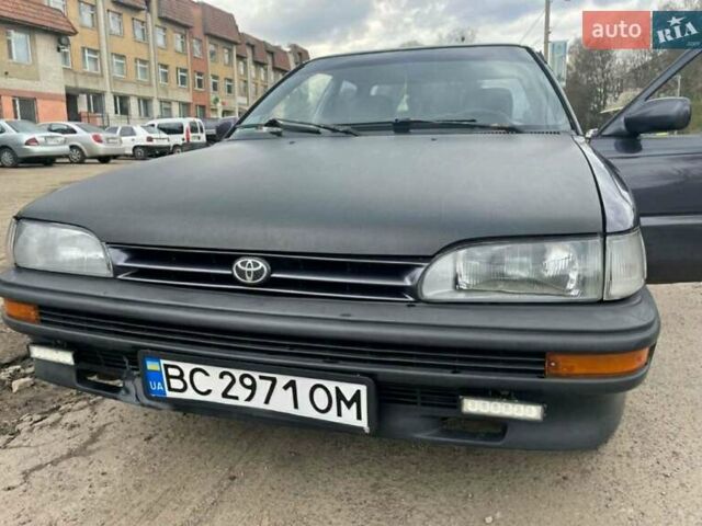 Синий Тойота Королла, объемом двигателя 1.3 л и пробегом 372 тыс. км за 1900 $, фото 1 на Automoto.ua