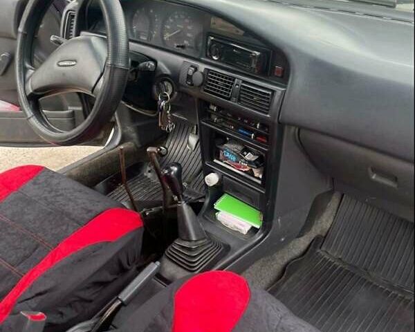 Синий Тойота Королла, объемом двигателя 1.3 л и пробегом 372 тыс. км за 1900 $, фото 3 на Automoto.ua