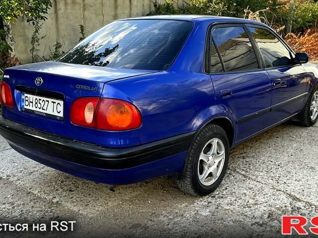 Синий Тойота Королла, объемом двигателя 1.3 л и пробегом 250 тыс. км за 1750 $, фото 1 на Automoto.ua