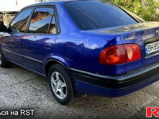 Синий Тойота Королла, объемом двигателя 1.3 л и пробегом 250 тыс. км за 1750 $, фото 2 на Automoto.ua