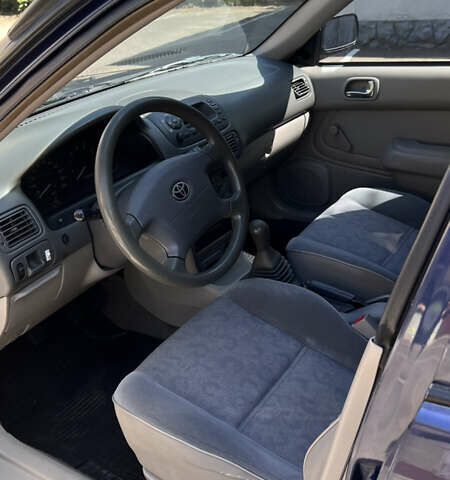 Синий Тойота Королла, объемом двигателя 1.4 л и пробегом 301 тыс. км за 2999 $, фото 14 на Automoto.ua