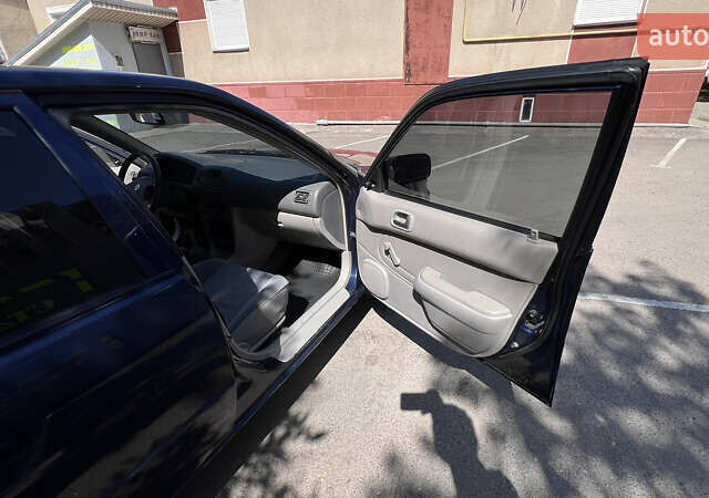 Синий Тойота Королла, объемом двигателя 1.4 л и пробегом 301 тыс. км за 2999 $, фото 19 на Automoto.ua