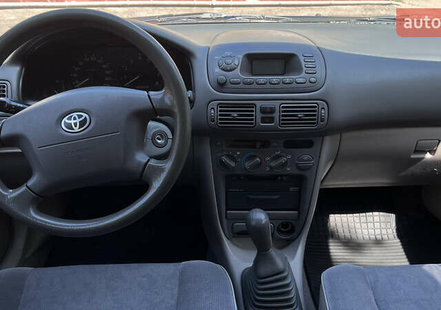 Синий Тойота Королла, объемом двигателя 1.4 л и пробегом 301 тыс. км за 2999 $, фото 21 на Automoto.ua