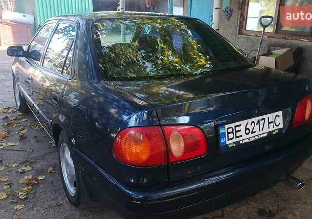 Синий Тойота Королла, объемом двигателя 1.59 л и пробегом 400 тыс. км за 3000 $, фото 7 на Automoto.ua