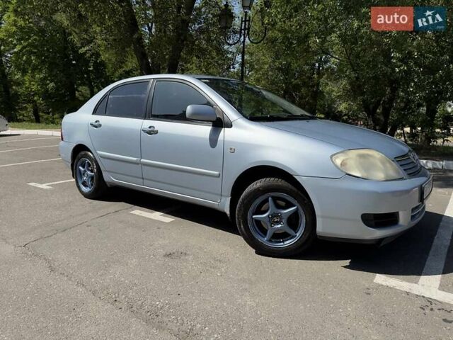 Синий Тойота Королла, объемом двигателя 1.6 л и пробегом 201 тыс. км за 5499 $, фото 6 на Automoto.ua