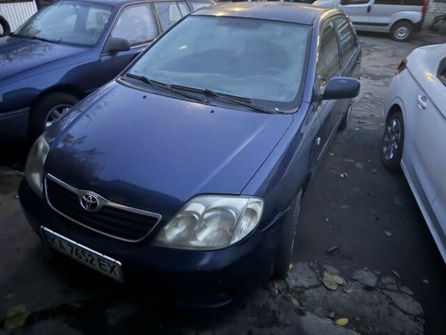 Синий Тойота Королла, объемом двигателя 1.4 л и пробегом 250 тыс. км за 1200 $, фото 1 на Automoto.ua