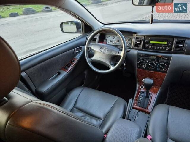 Синий Тойота Королла, объемом двигателя 1.8 л и пробегом 182 тыс. км за 6900 $, фото 26 на Automoto.ua