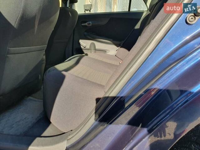 Синій Тойота Королла, об'ємом двигуна 1.6 л та пробігом 99 тис. км за 6999 $, фото 12 на Automoto.ua