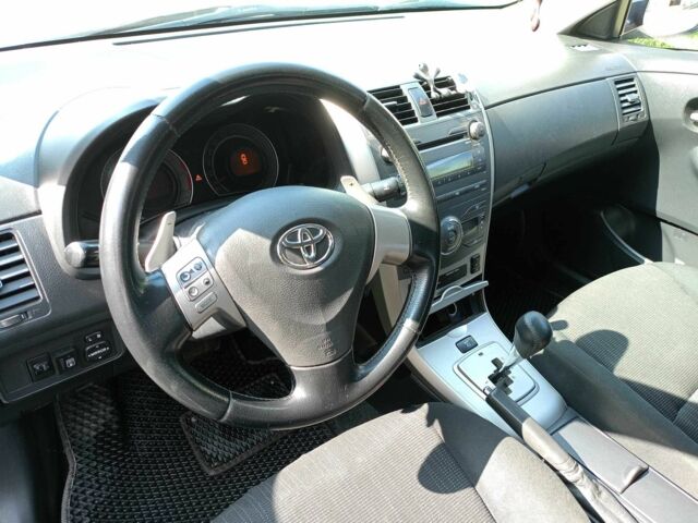 Синій Тойота Королла, об'ємом двигуна 1.6 л та пробігом 223 тис. км за 5499 $, фото 5 на Automoto.ua