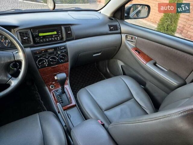 Синий Тойота Королла, объемом двигателя 1.8 л и пробегом 182 тыс. км за 6900 $, фото 25 на Automoto.ua