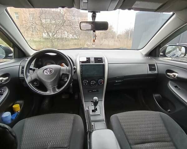 Синий Тойота Королла, объемом двигателя 1.6 л и пробегом 261 тыс. км за 7200 $, фото 2 на Automoto.ua