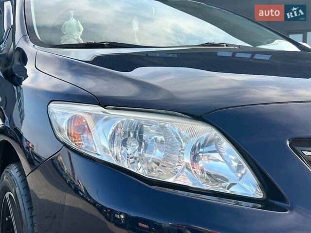 Синій Тойота Королла, об'ємом двигуна 1.6 л та пробігом 198 тис. км за 8690 $, фото 11 на Automoto.ua