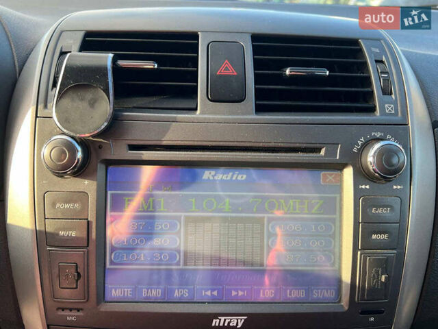 Синій Тойота Королла, об'ємом двигуна 1.6 л та пробігом 198 тис. км за 8690 $, фото 27 на Automoto.ua