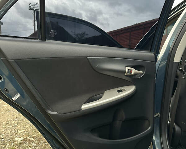 Синій Тойота Королла, об'ємом двигуна 1.6 л та пробігом 239 тис. км за 6900 $, фото 21 на Automoto.ua